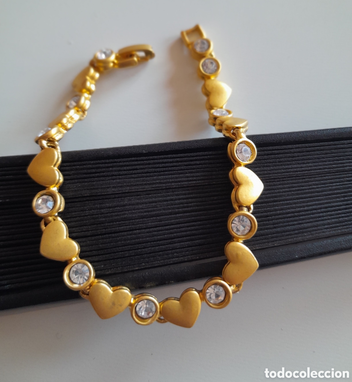 Joyeria: PULSERA CHAPADA EN ORO CON CIRCONIOS. CORAZONES - Foto 1