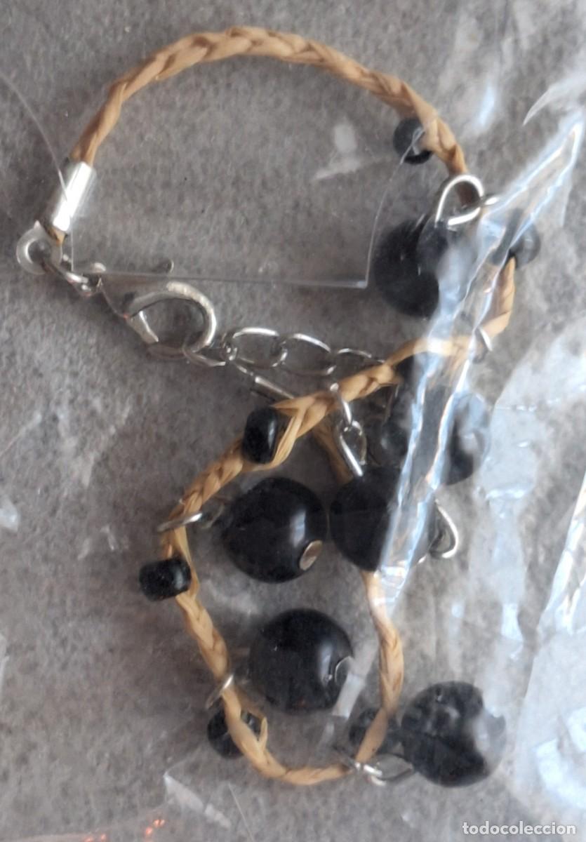 Joyeria: PULSERA DE CUERDA CON ESFERAS PL&Aacute;STICAS NEGRAS - Foto 1