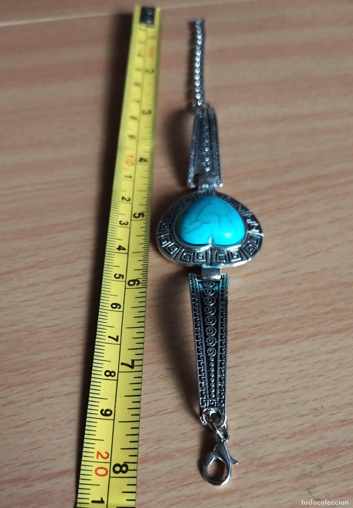 Joyeria: Pulsera plateada con piedra azul turquesa. Forma coraz&oacute;n. - Foto 2