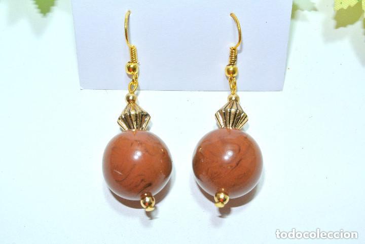 Joyeria: Pendientes color marr&oacute;n y oro, A&ntilde;o 2000, Nuevos - Foto 1
