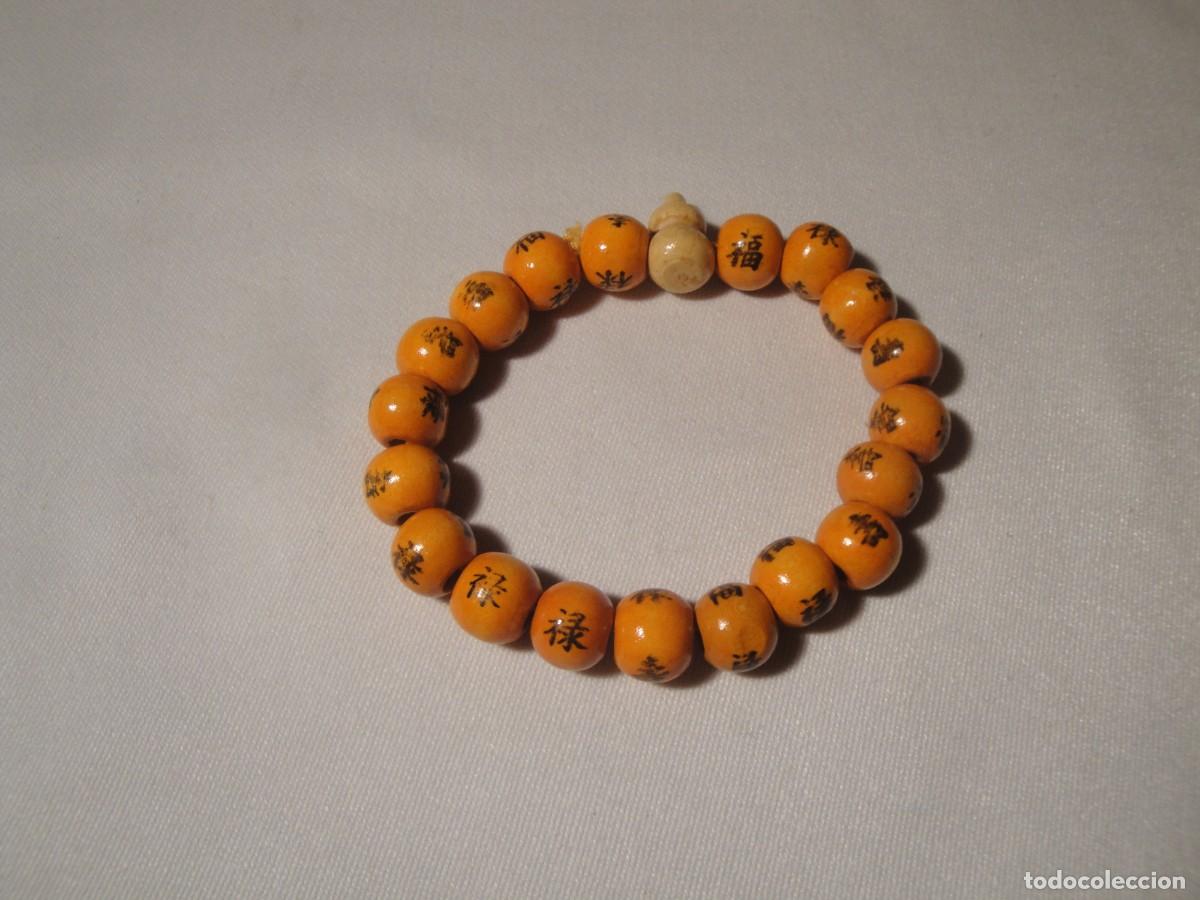 Joyeria: Pulsera el&aacute;stica con bolas madera color naranja. Nueva. - Foto 1