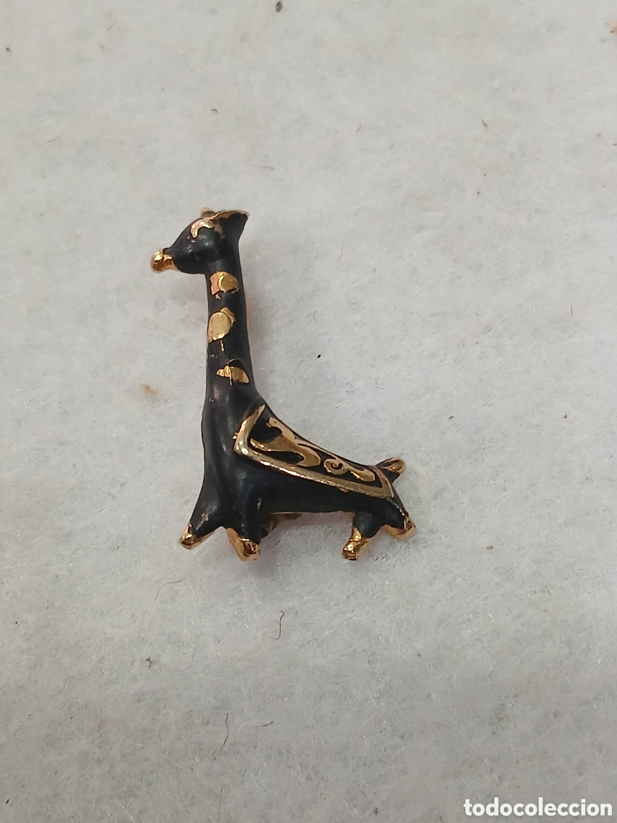 Joyeria: Broche jirafa negra y dorada. (L0) - Foto 1