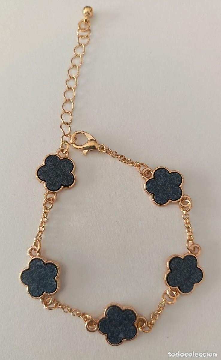 Joyeria: Pulsera dorada con flores. Regulable. - Foto 1