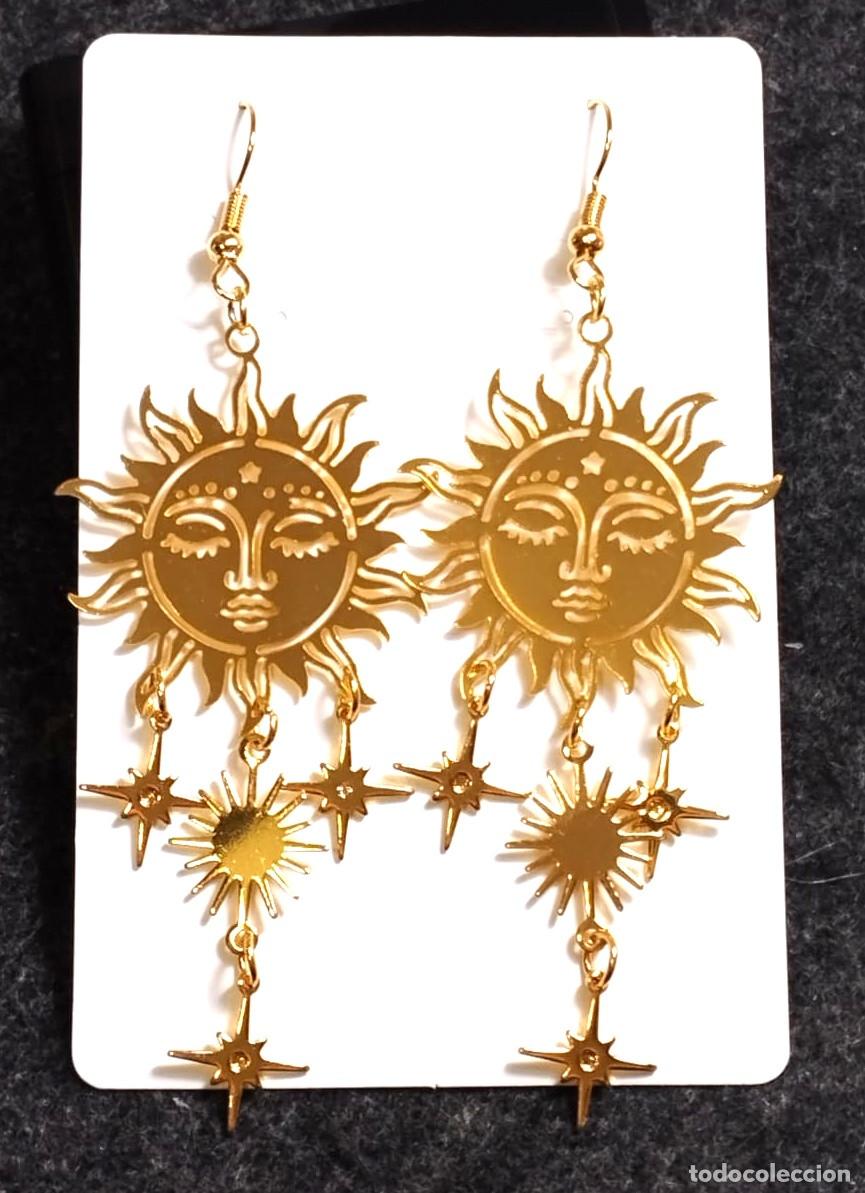 Joyeria: Pendientes largos con sol color oro, Nuevos - Foto 1