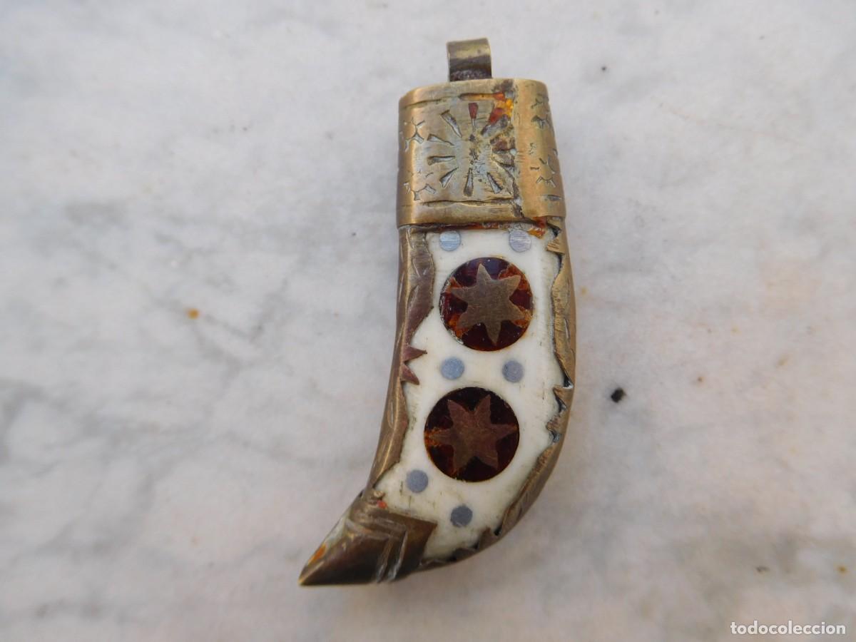 Joyeria: Colgante de bronce con forma de colmillo - Foto 1