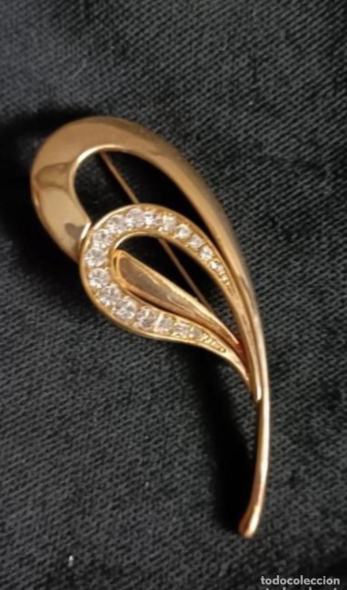 Gioielleria: Broche solapa dorado