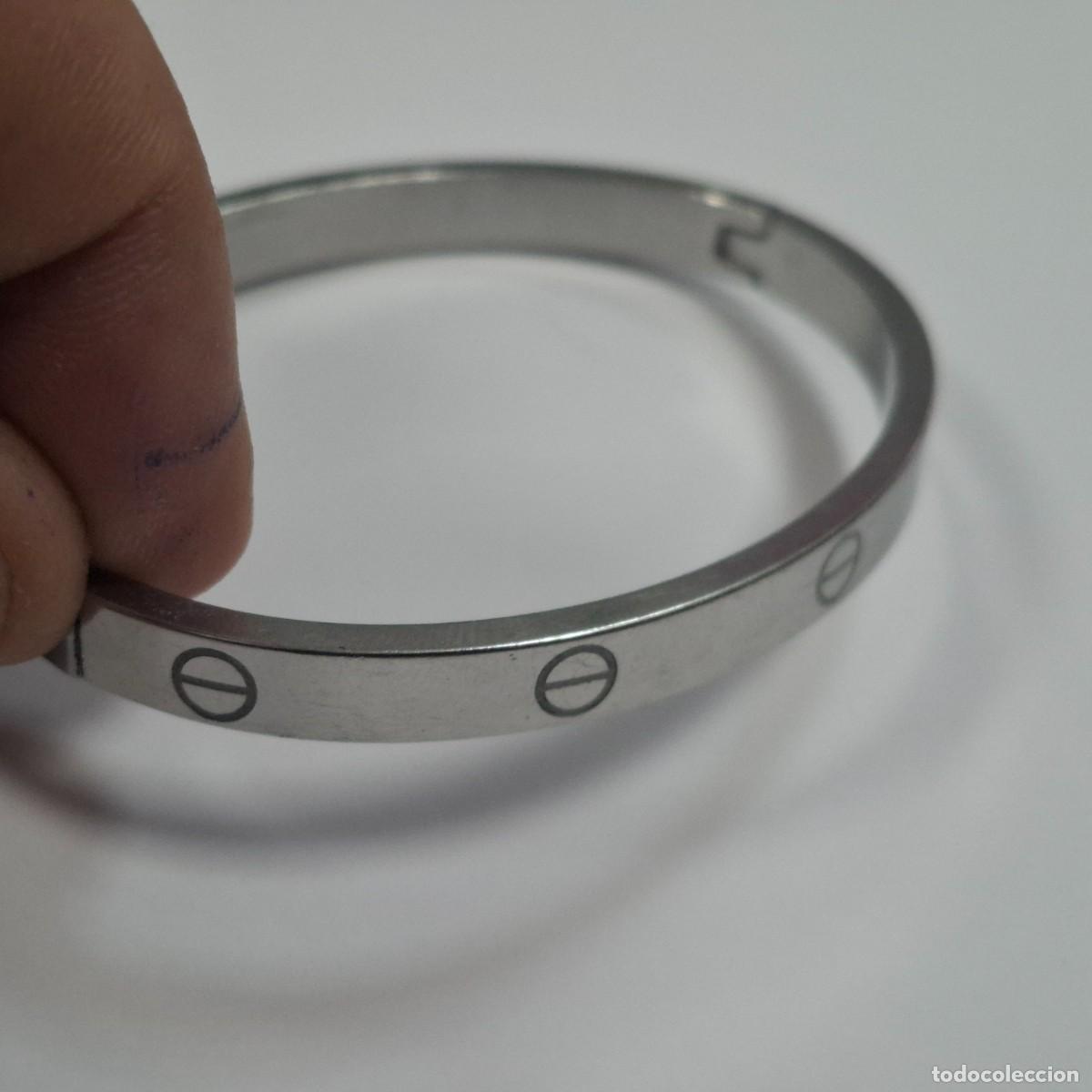 Joyeria: Pulsera de acero inoxidable ( imitacion de Cartier, modelo love de oro blanco)