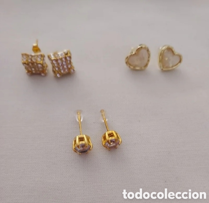 Joyeria: Tres pares de pendientes dorados