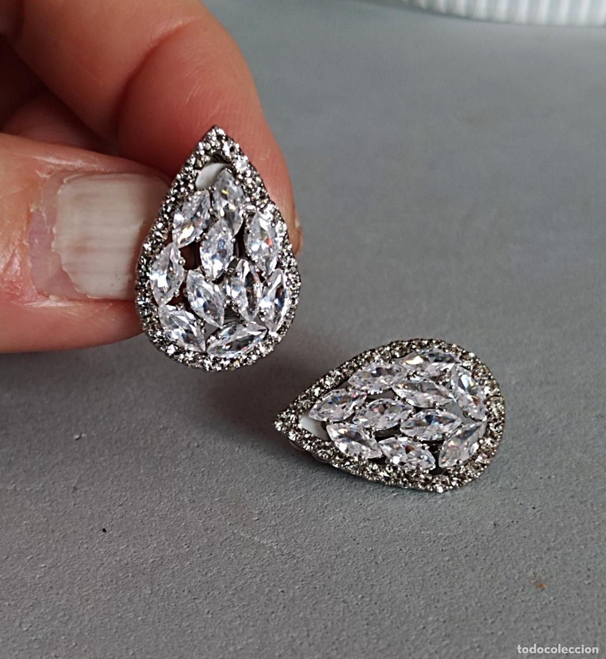 Gioielleria: Pendientes plateados de clip con brillantitos.