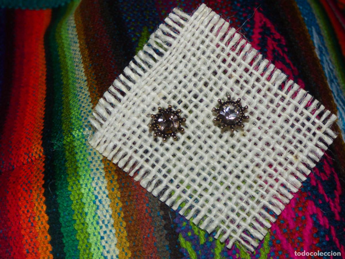 Joyeria: Pendientes sol,con cristales de diferentes colores.