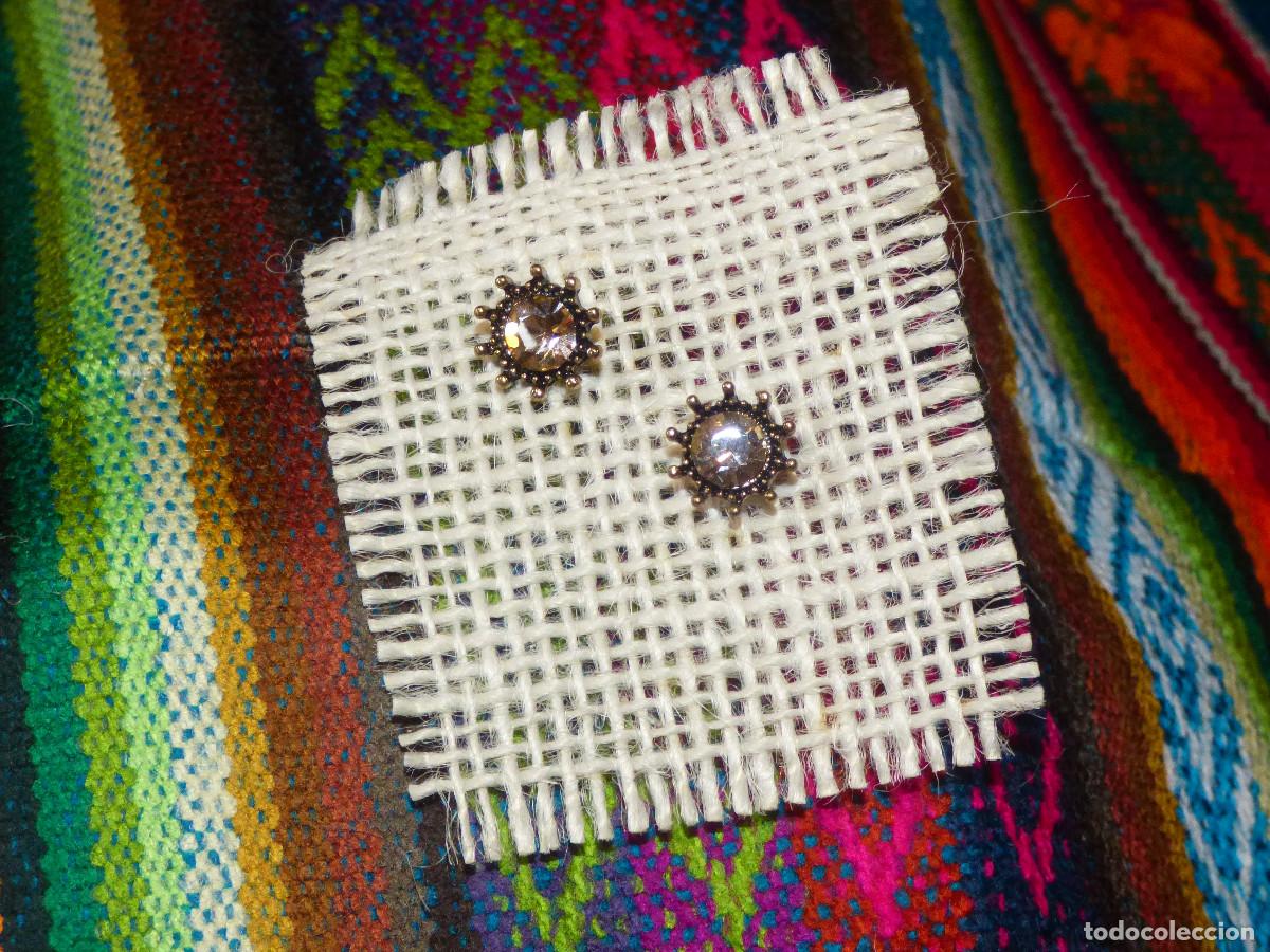 Joyeria: Pendientes sol,con cristales de diferentes colores.