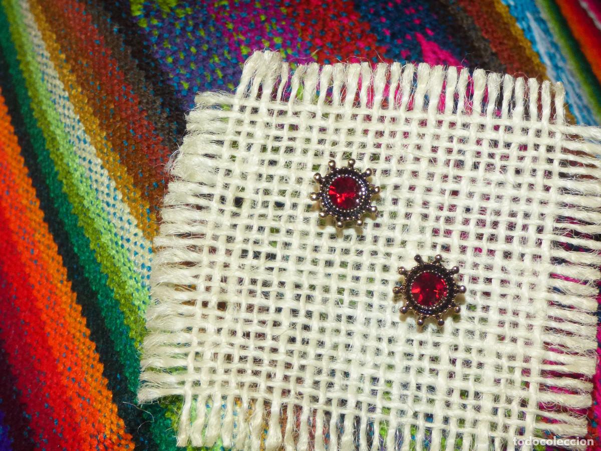 Joyeria: Pendientes sol,con cristales de diferentes colores.