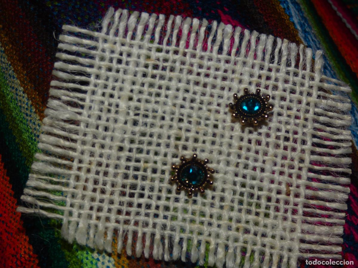 Joyeria: Pendientes sol,con cristales de diferentes colores.
