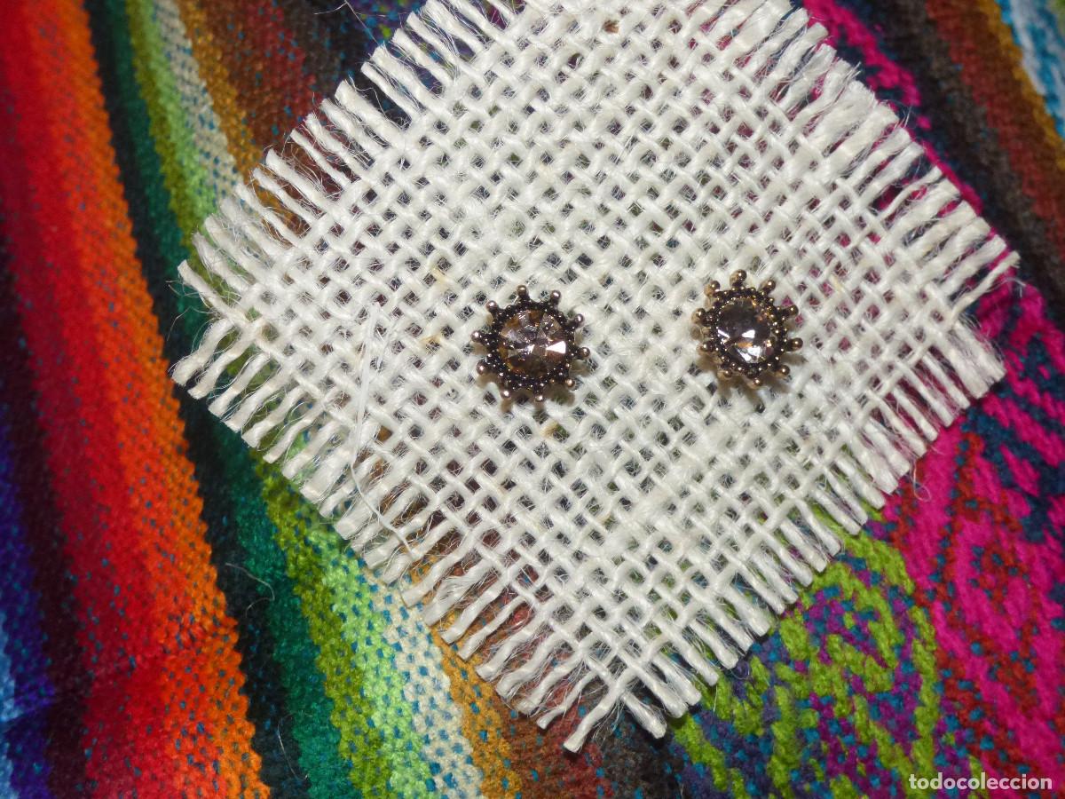 Joyeria: Pendientes sol,con cristales de diferentes colores.