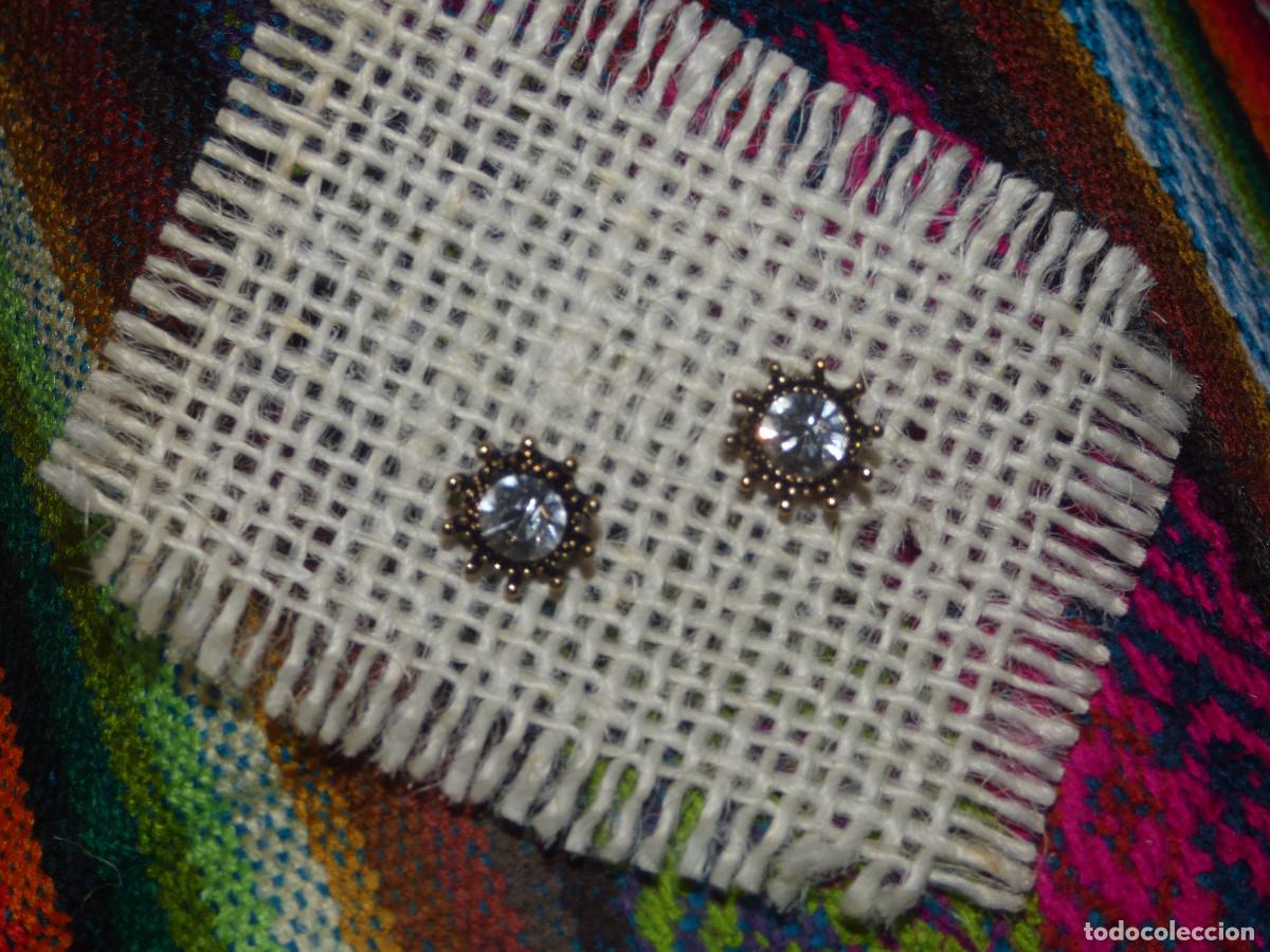 Joyeria: Pendientes sol,con cristales de diferentes colores.