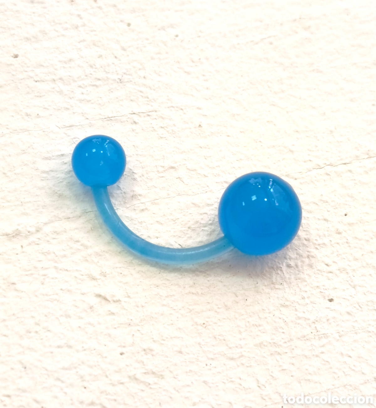 Joyeria: Piercing para ombligo bioflex color azul, antial&eacute;rgico, nuevo