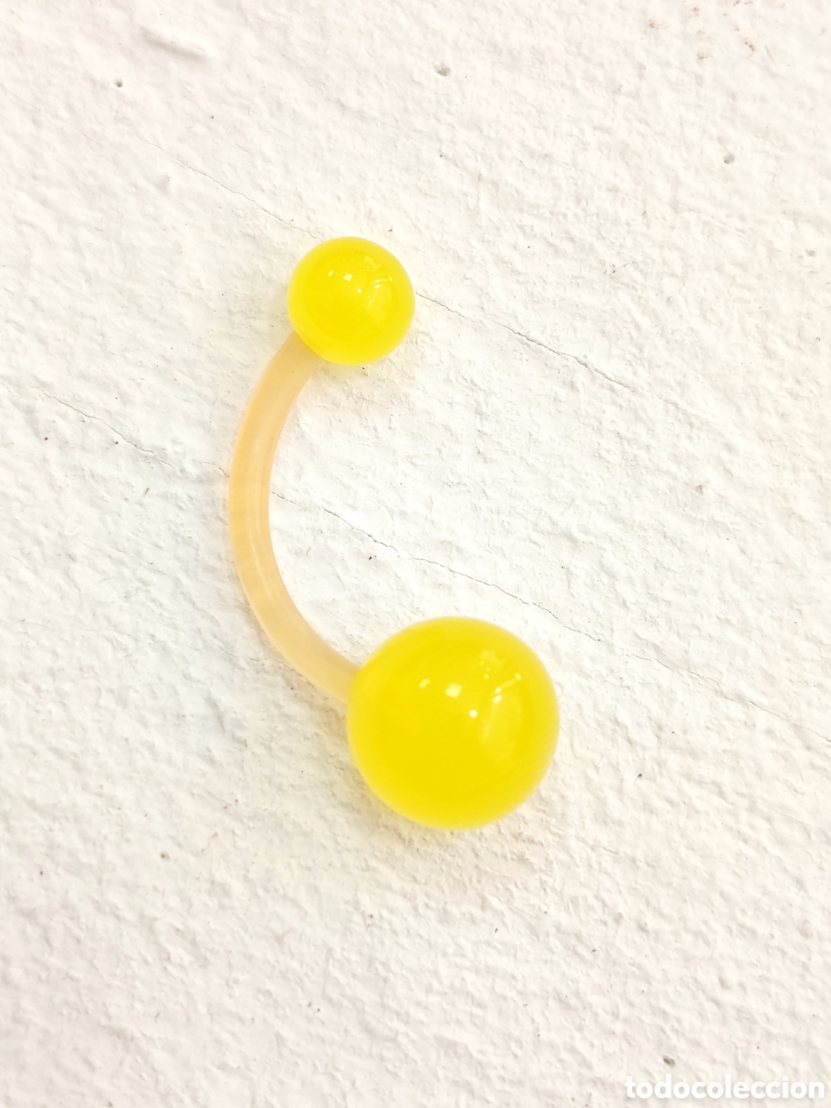 Joyeria: Piercing para ombligo bioflex color amarillo, antial&eacute;rgico, nuevo