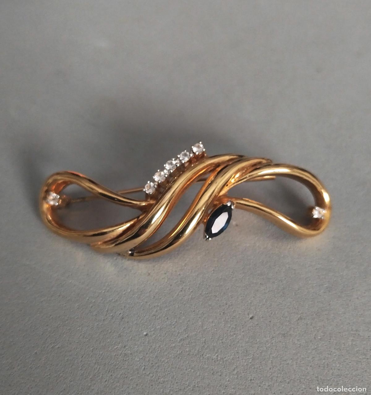 Joyeria: Precioso broche dorado con cristalitos.
