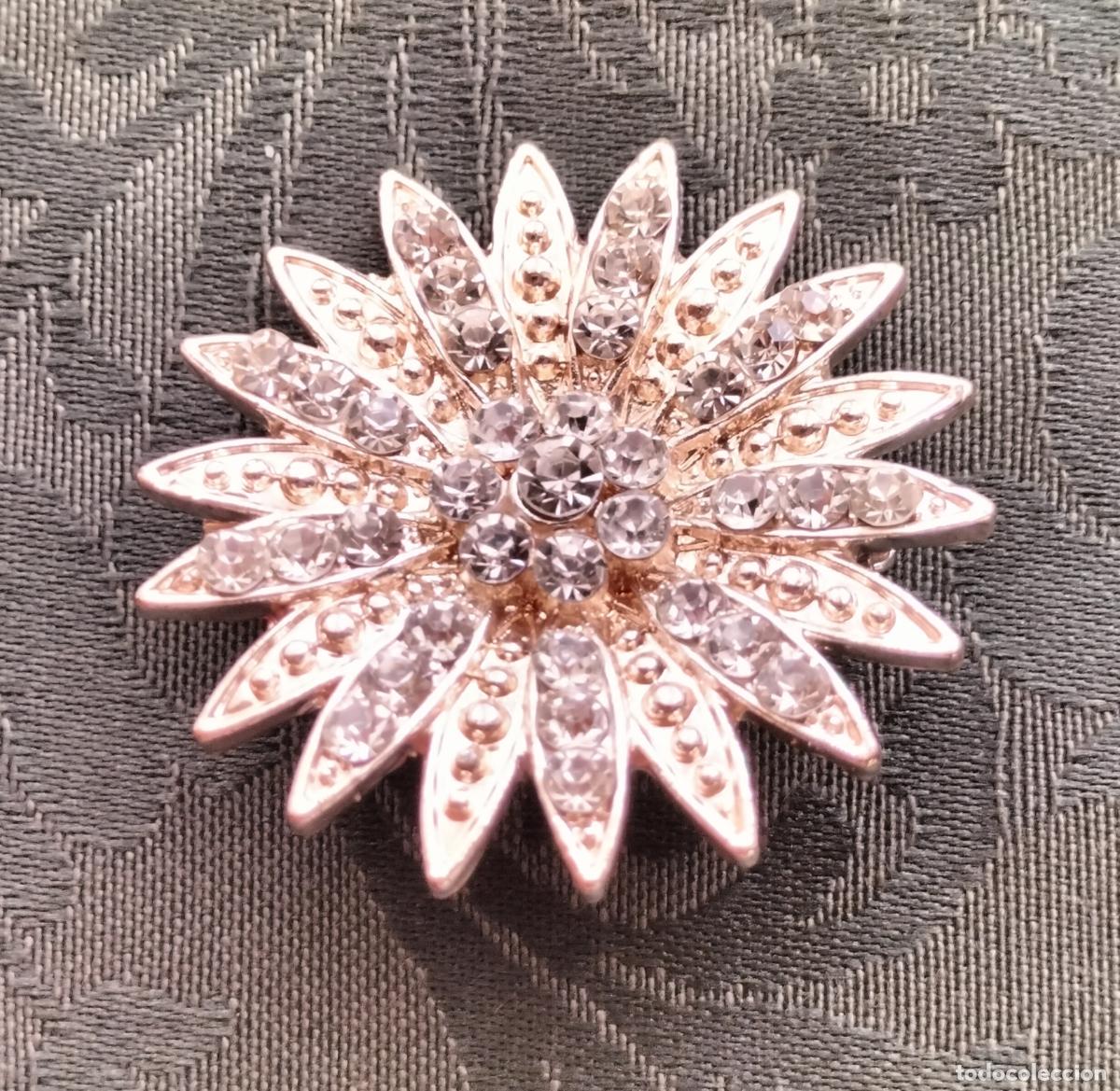 Joyeria: GIRASOL - BROCHE DE METAL PLATEADO Y CRISTAL.