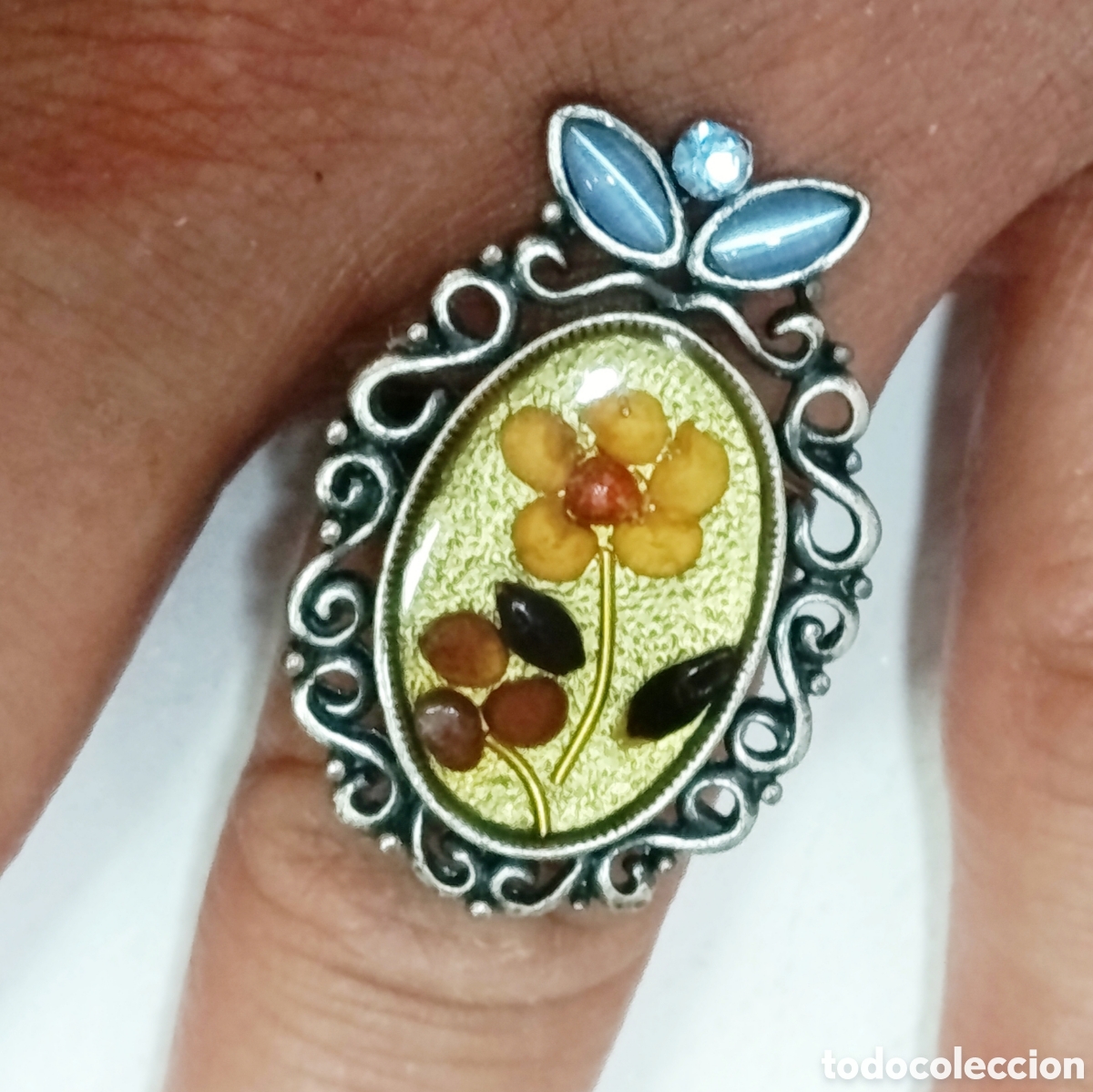 Joyeria: Anillo color plata con flor de semillas, talla ajustable, a&ntilde;o 2000, nuevo