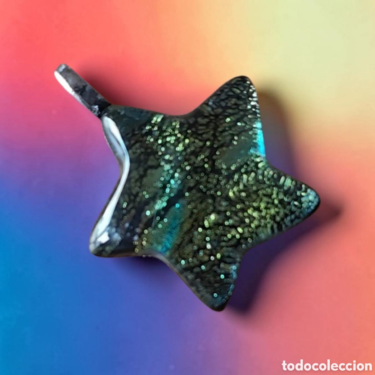 Joyeria: :::: EN27 - COLGANTE EN FORMA DE ESTRELLA