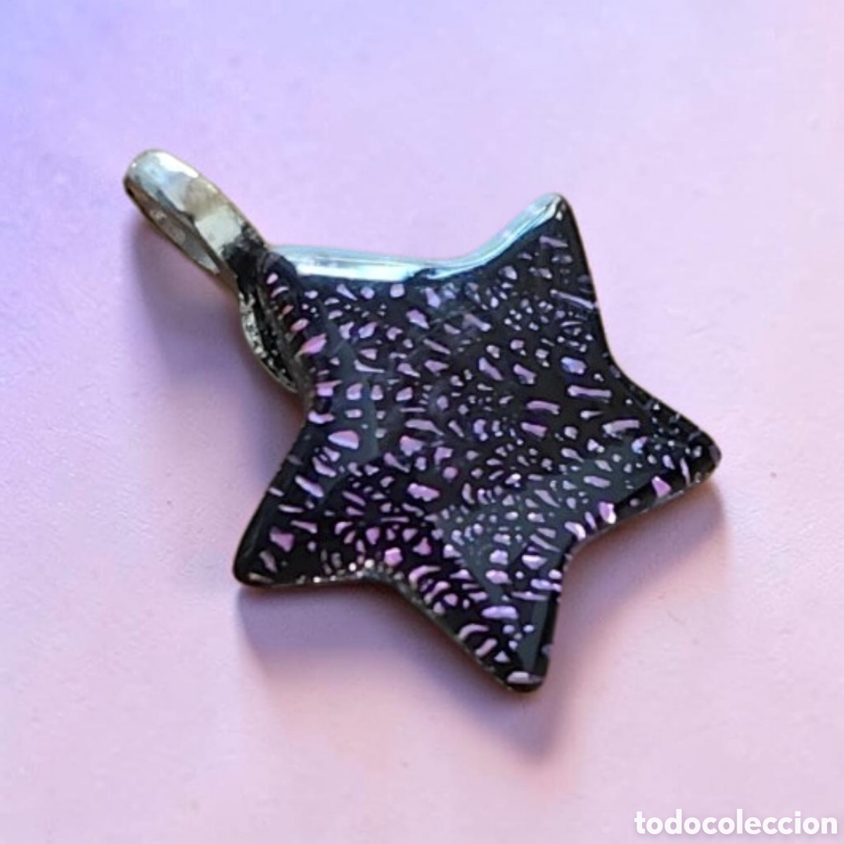 Joyeria: :::: EN28 - COLGANTE EN FORMA DE ESTRELLA