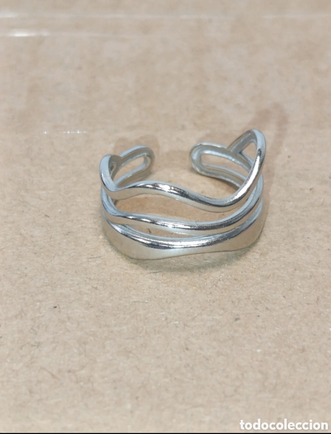 Joyeria: Anillo ajustable acero plateado triondulado talla 6