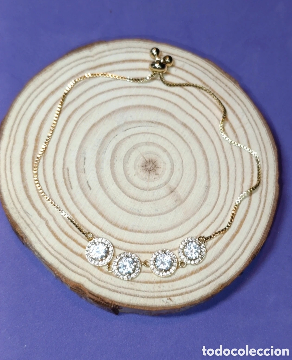 Joyeria: Pulsera acero dorado y cuatro circonitas