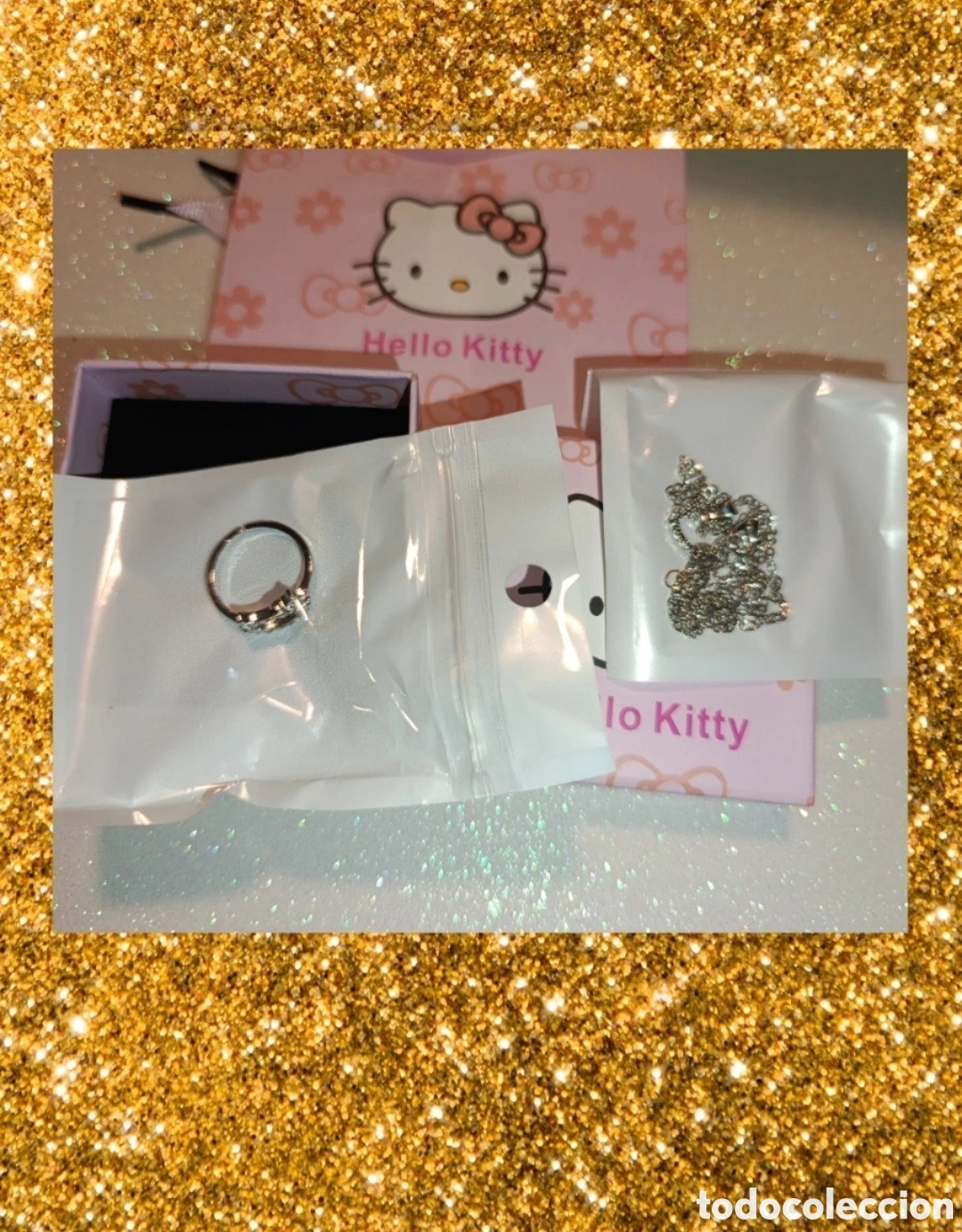 Joyeria: Conjunto bisuteria plateada collar y anillo Hello Kitty