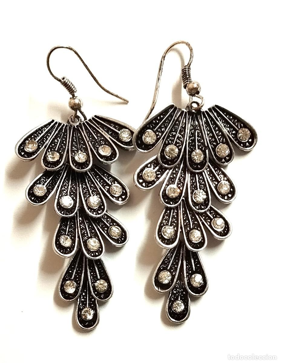 Joyeria: Pendientes largos plateados hojas, bisuter&iacute;a