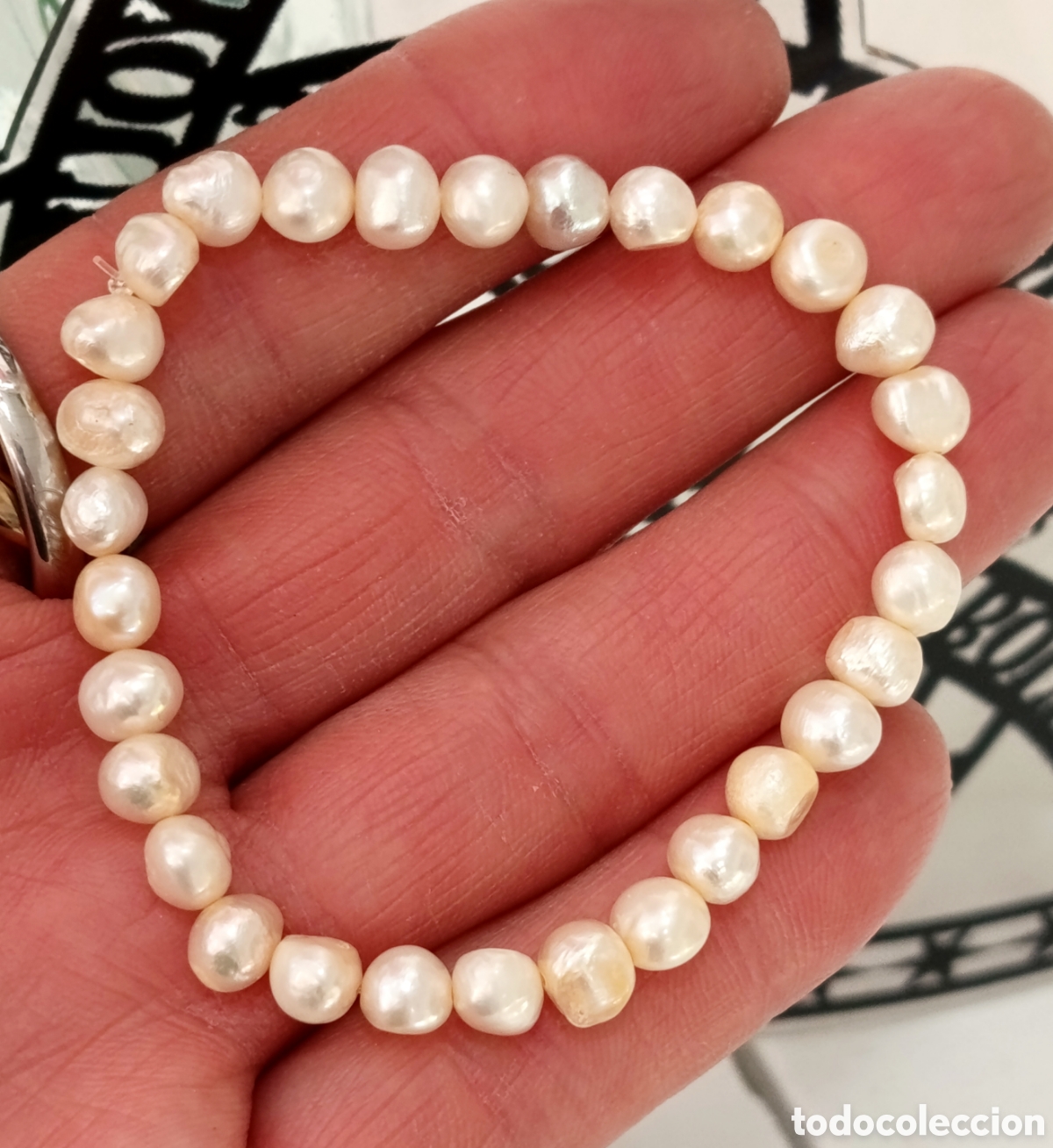 Joyeria: Pulsera de perlas naturales preparada energ&eacute;ticamente con palo santo, nueva