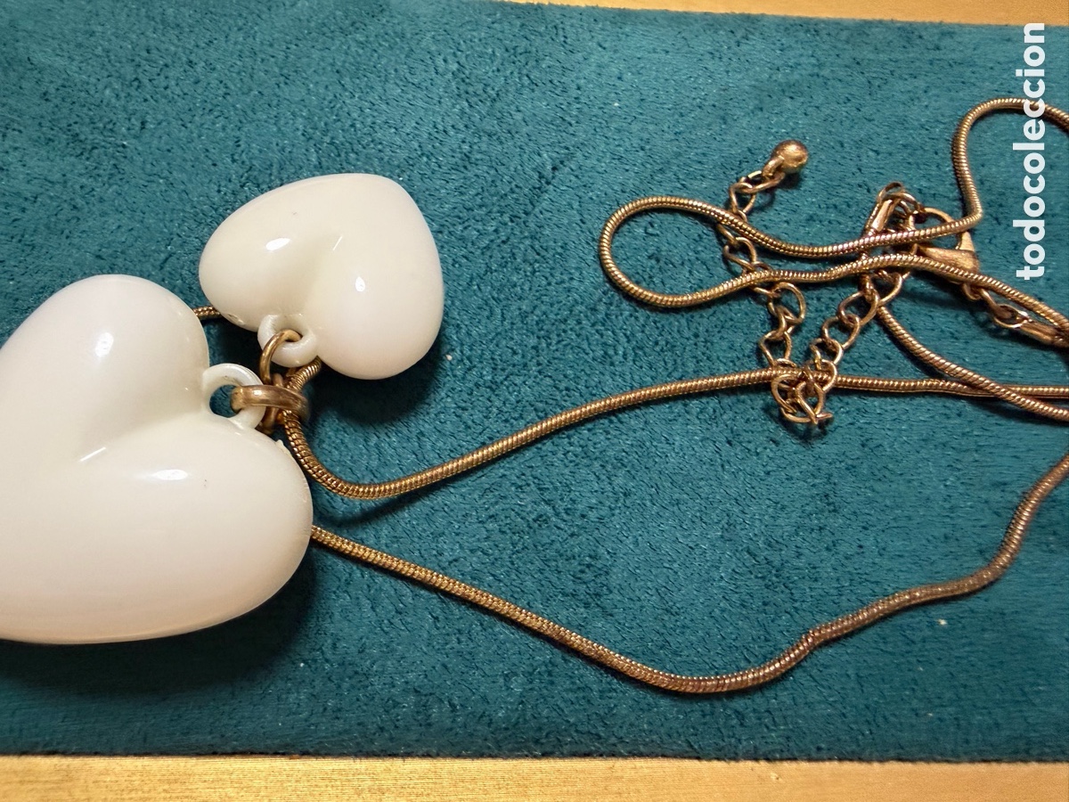 Joyeria: Cadena dorada con dos corazones