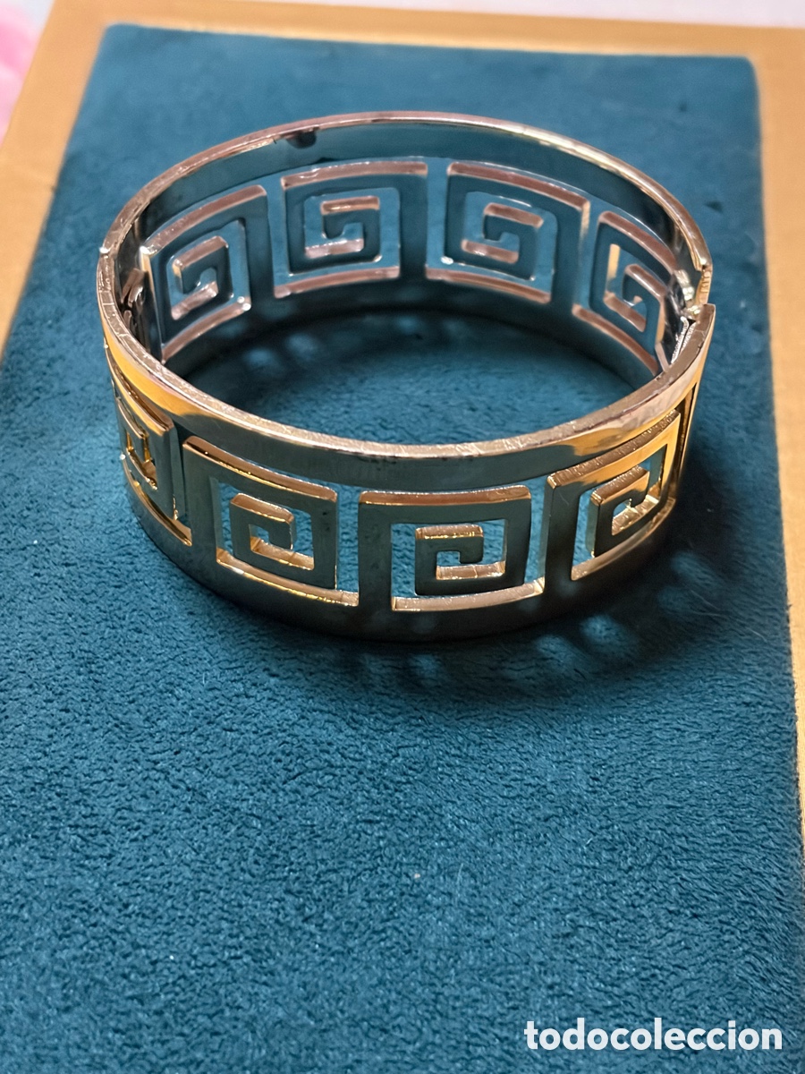 Joyeria: Pulsera de metal dorado