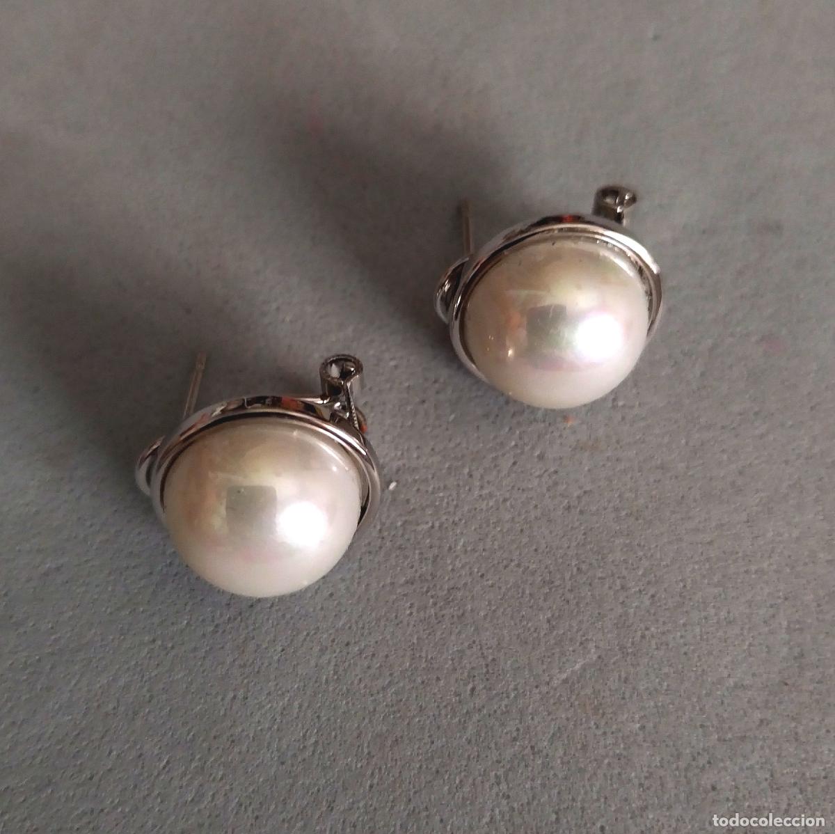 Joyeria: Pendientes plateados con perlas