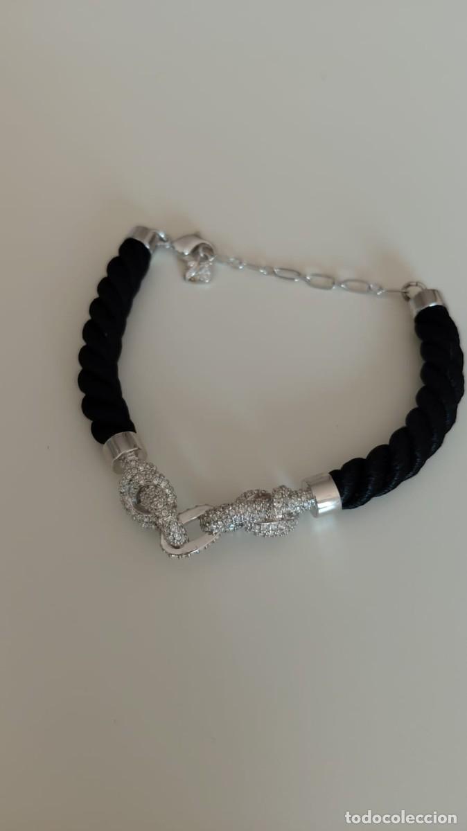 Joyeria: Pulsera Swarovski de cord&oacute;n negro con cristales pav&eacute; y motivo de nudo