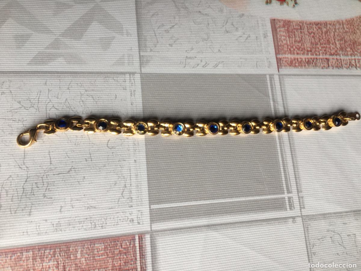 Joyeria: PULSERA DORADA CON PIEDRAS AZULES