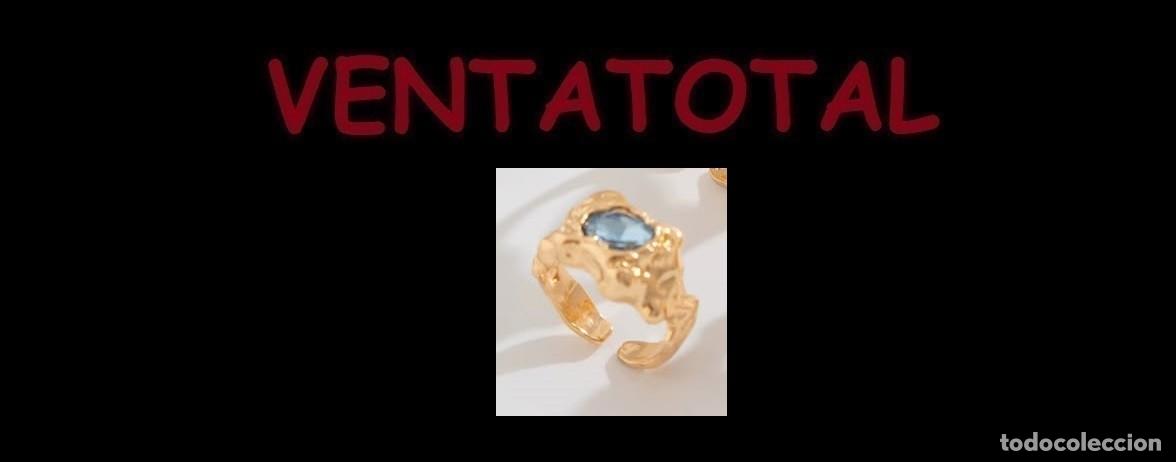 Joyeria: SORTIJA ADAPTABLE DE ORO AMARILLO DE 22 KILATES LAMINADO - CON TIPO AGUAMARINA PESA 4,6 GRAMOS