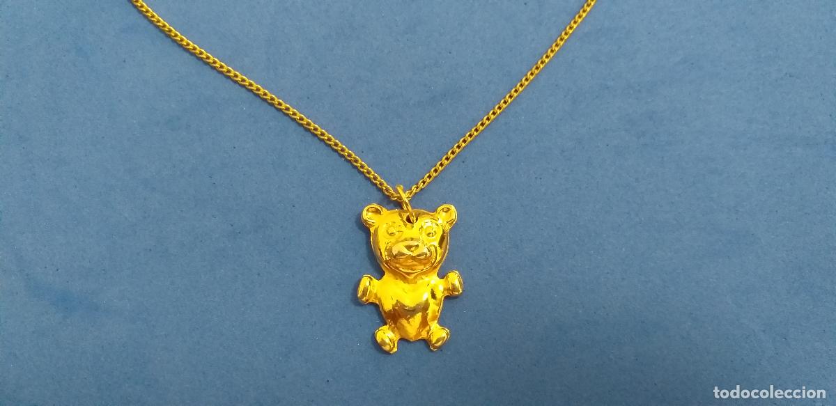 Joyeria: Cadena dorada. Colgante de osito, oso