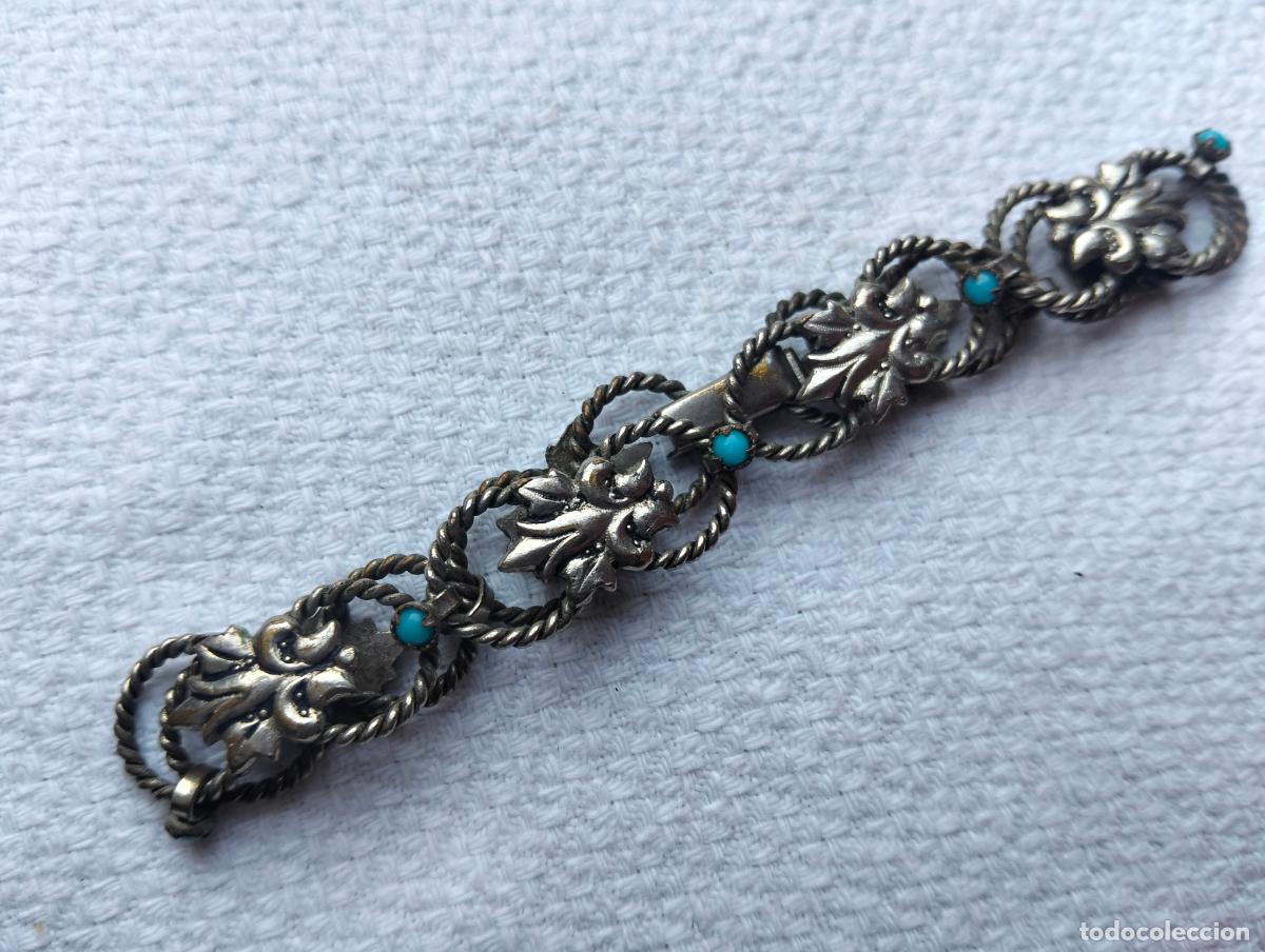 Schmuck: Pulsera de metal color plateado con piedrecitas minerales color azul y figuras forma hoja bisuter&iacute;a