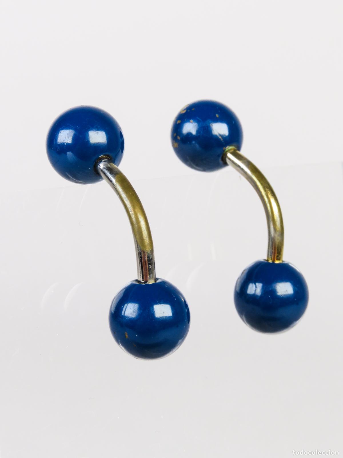 Joyeria: Gemelos bola azul y metal dorado segunda mitad S XX