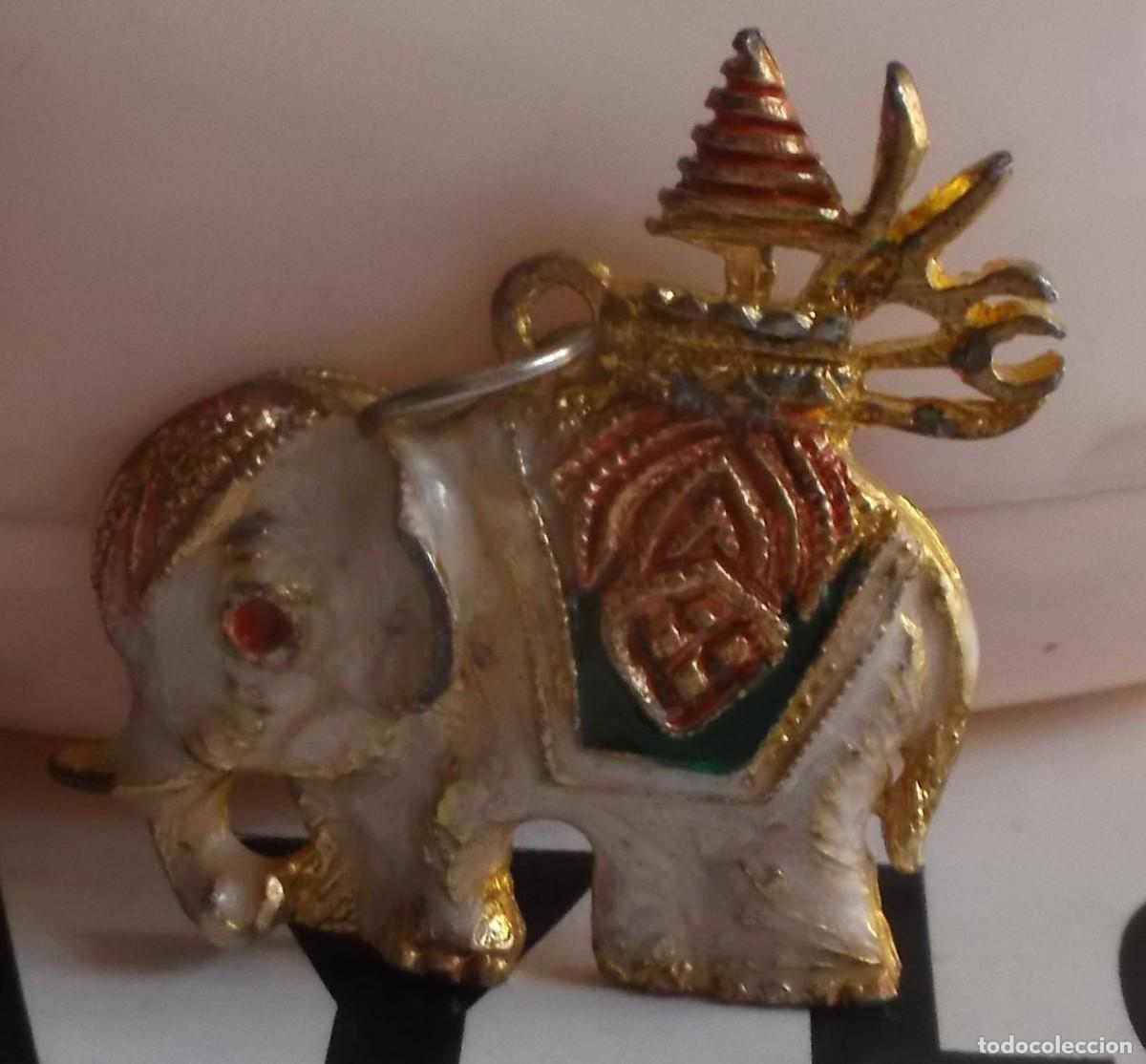 Joyeria: colgante elefante con adornos dorados traido de birmania