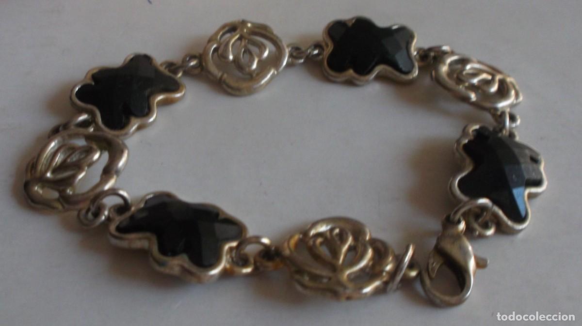 Joyeria: pulsera plateada con filigranas y ositos en negro