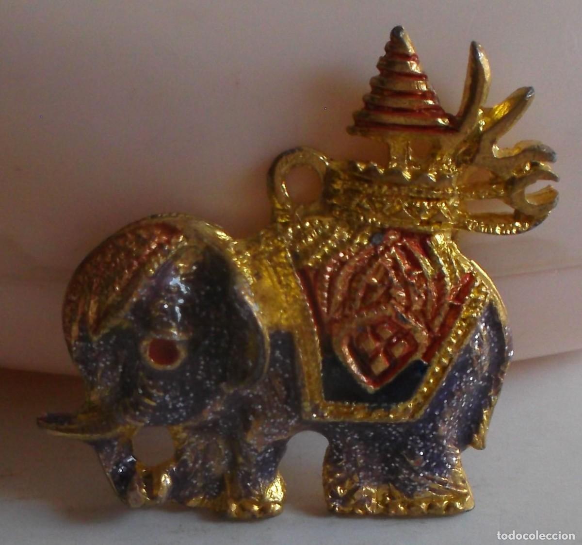 Joyeria: colgante elefante de Birmania con detalles en dorado
