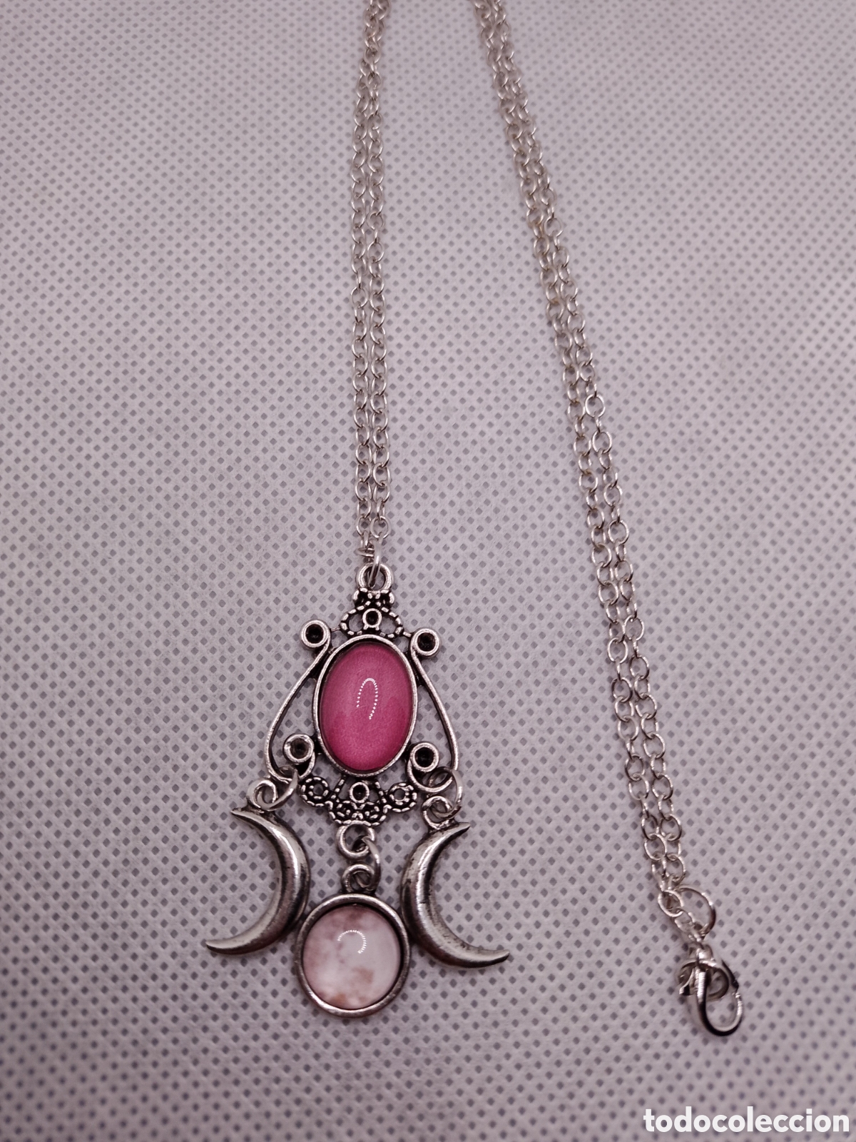 Joyeria: Colgante triple luna rosa y plateado.