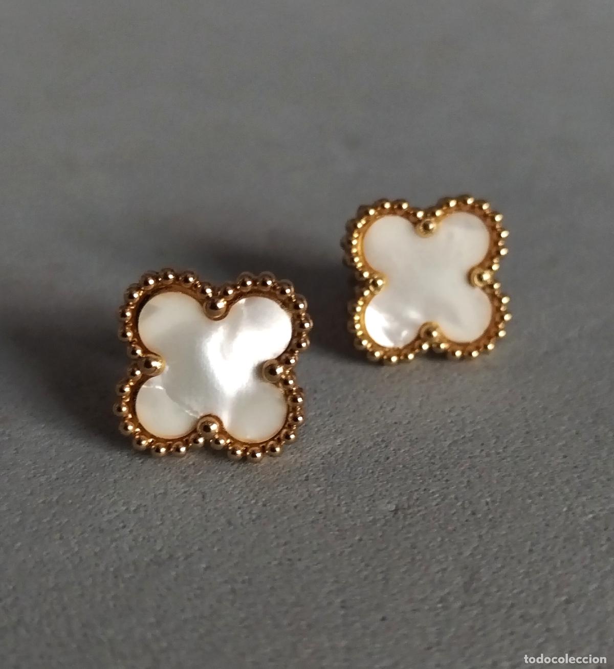 Joyeria: Pendientes dorados con n&aacute;car.