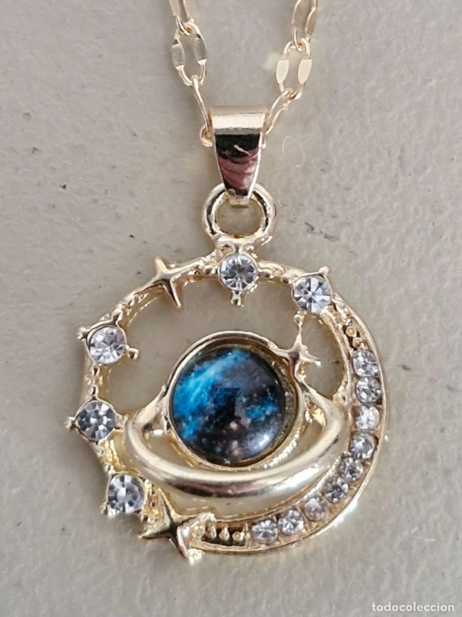 Joaillerie: Elegante collar con dise&ntilde;o estrellas y planeta.