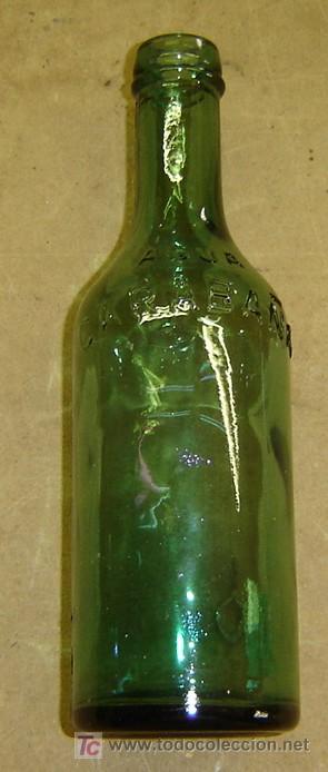 Alte Flaschen: BOTELLA ANTIGUA EN RELIEVE - AGUA DE CARABA&Ntilde;A