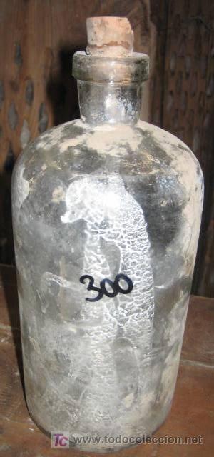 Botellas antiguas: Botella de vidrio de 21 cms de alto - Foto 1