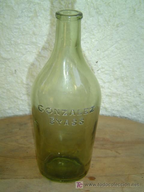 Botellas antiguas: BOTELLA GONZALEZ BYASS LETRAS EN RELIEVE Y N&ordm; EN LA BASE - Foto 1