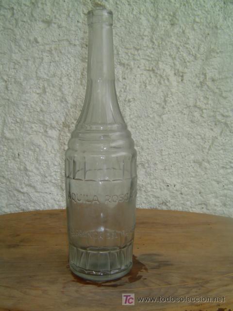 Botellas antiguas: BOTELLA AQUILA ROSSA LETRAS EN RELIEVE - Foto 1